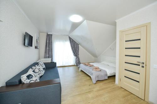 Ένα ή περισσότερα κρεβάτια σε δωμάτιο στο Forest Hotel Ковель