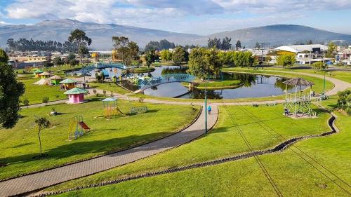 an aerial view of a park with a playground at Hospedaje San Fernando in Cayambe