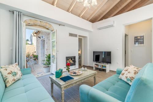 Μια τηλεόραση ή/και κέντρο ψυχαγωγίας στο Fiscardo Luxury Stone Villa Alex ,with sunset view!