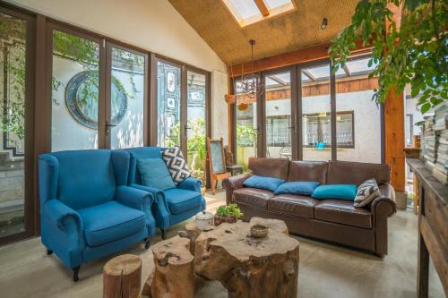 a living room with a couch and a table at Z.Garden in Dali