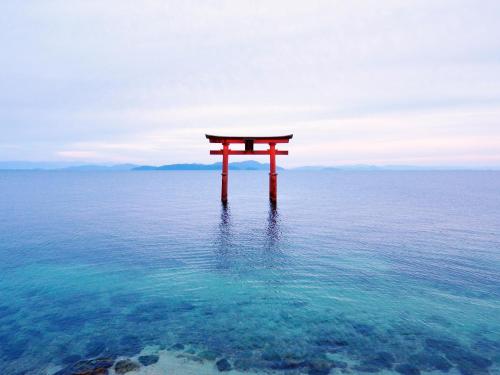 a red object in the water in the ocean at Grand Park Hotel Okubiwako Makino in Takashima