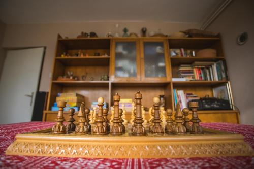 a chess board sitting on top of a table at Old Chestnut Vacation Home in Varaždinske Toplice