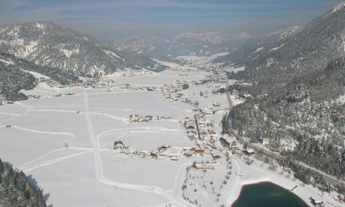 an aerial view of a ski resort with snow at Appartments Geisler in Achenkirch