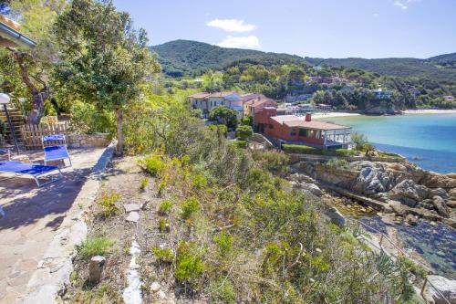 a house with a view of the water at Un Nido sul Mare - Goelba in Portoferraio