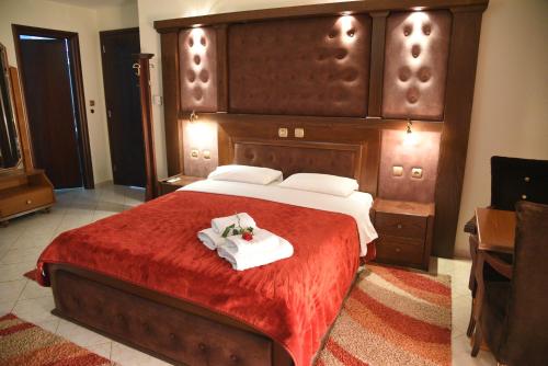 Letto o letti in una camera di Hotel Παραδοσιακό