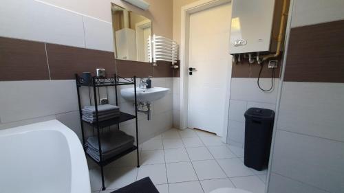 Koupelna v ubytování P.D.S APARTAMENT