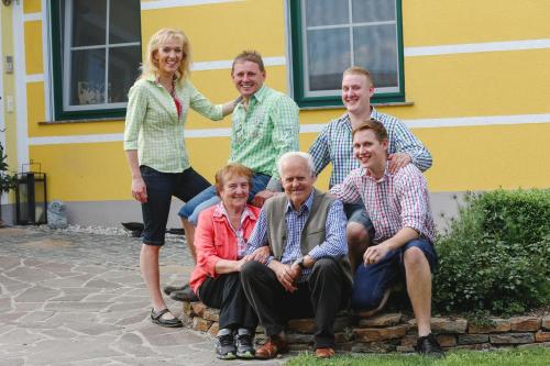 a group of people posing for a picture in front of a building at Kerndlerhof in Ybbs an der Donau
