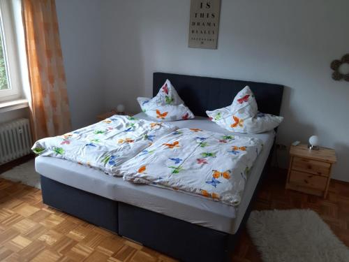 a bed with pillows on it in a bedroom at Ferienwohnung Birgit in Winterberg