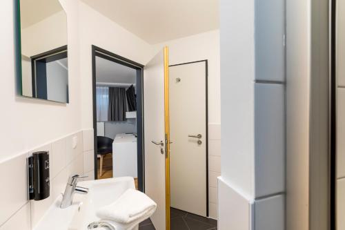 Koupelna v ubytování mk monteurzimmer eschborn