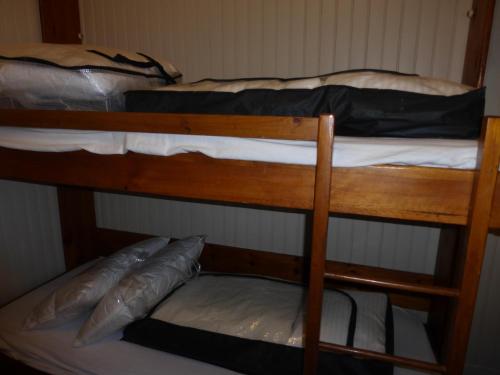 Двухъярусная кровать или двухъярусные кровати в номере RÉSIDENCE DES NEIGES 2052