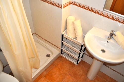 Koupelna v ubytování Palm Beach, 2 dormitorios, playa 50m, by Bookindenia