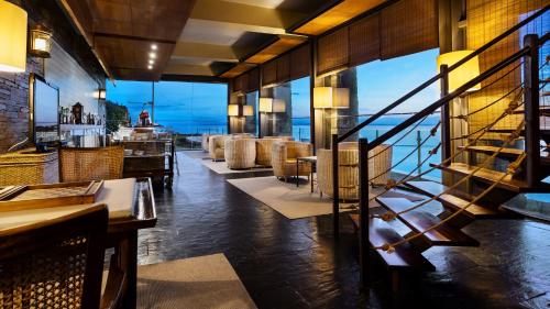a restaurant with a view of the ocean at Pousada da Ria in Torreira