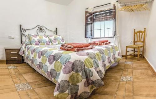 En eller flere senge i et værelse på Villa Godoy