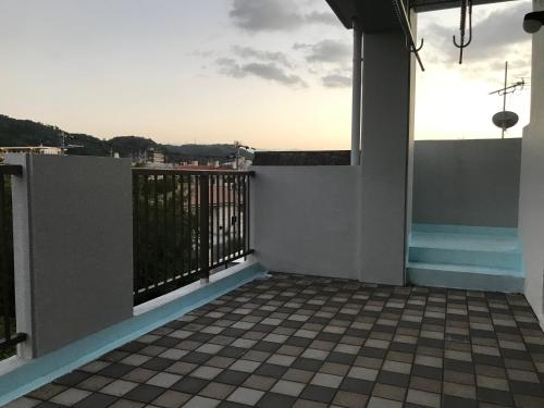 a view from the balcony of a house at Takana in Nago