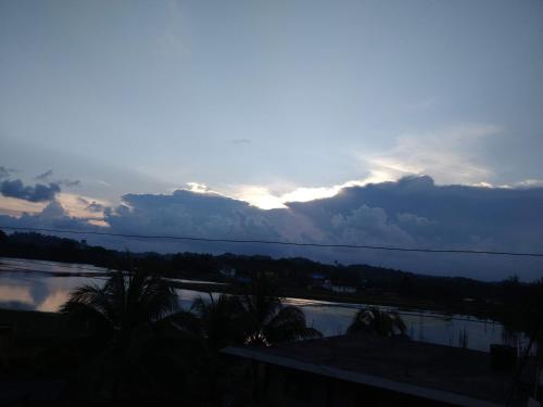 a view of a river with a cloudy sky at Aqua Horizon in Port Blair