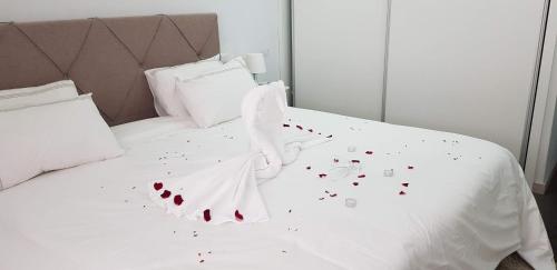 Postel nebo postele na pokoji v ubytování Residencial Dom Manuel