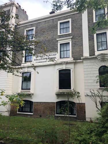 a building with a sign on the side of it at 2 Bedroom Apartment close to Camden Town in London