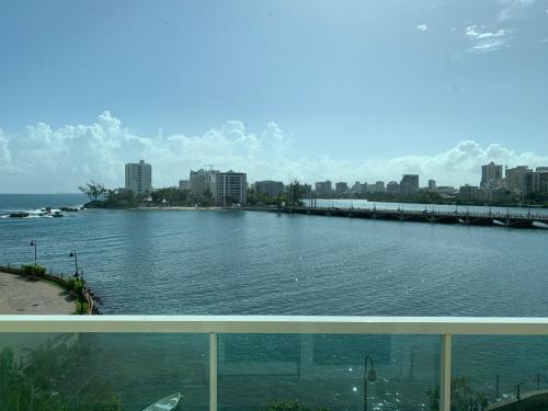 a view of a river from the balcony of a building at Costa Bahia Hotel Paseo Caribe in San Juan