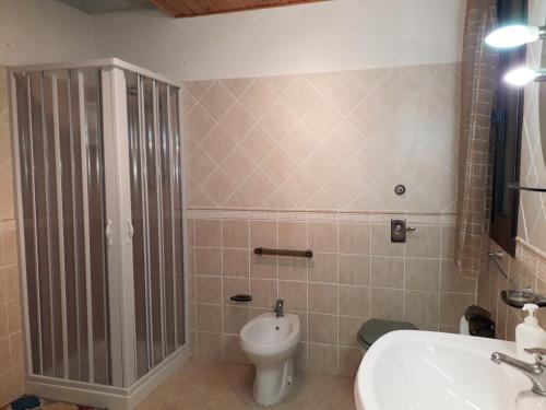 a bathroom with a toilet and a sink at Celebrity House in Marsala