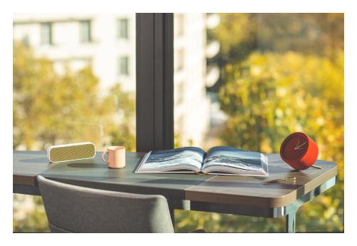 a table with an open book on it with a window at Novotel Paris Porte Versailles in Paris