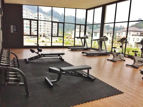 a gym with a bunch of exercise bikes in a room at Cameron Highland Guesthouse in Tanah Rata