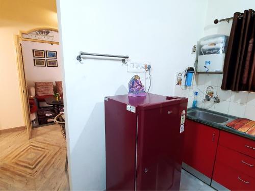 Kuchyň nebo kuchyňský kout v ubytování Aditya Premium HomeStay- Furnished Air Conditioned- 2BHK