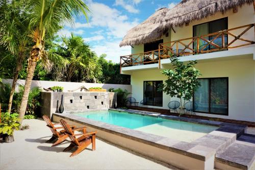 Villa con piscina y complejo en La Puerta Azul Beachfront - Adults Only en Holbox Island