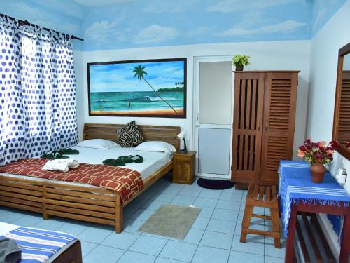 Katil atau katil-katil dalam bilik di Hotel Happy Tuna