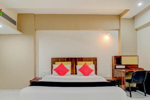 מיטה או מיטות בחדר ב-Dhuri Resort