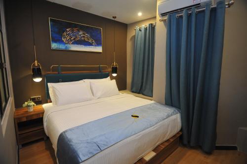 Ένα ή περισσότερα κρεβάτια σε δωμάτιο στο Skye Hotel Sunway