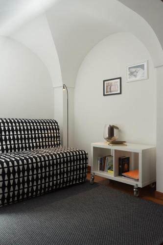 a living room with a couch and a table at Casa Gnostra in Noci