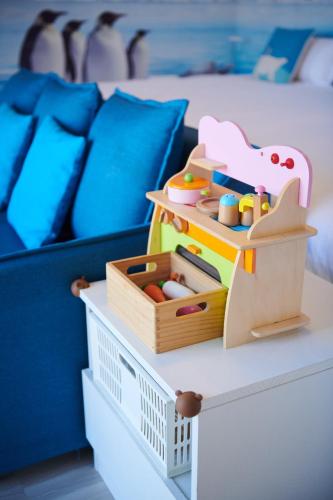 Wunan Zoo Family Homestayにあるベッド