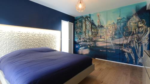เตียงในห้องที่ Villa Escapade Colmar avec parking