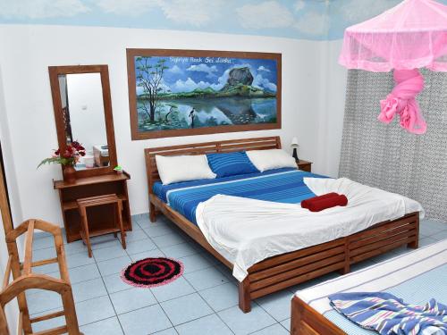 Katil atau katil-katil dalam bilik di Hotel Happy Tuna