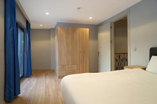 MENE SUITESにあるベッド