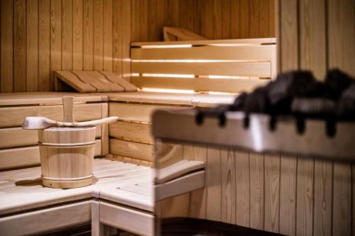 a sauna with a roll of toilet paper in it at Golf- & Sporthotel Hof Maran in Arosa