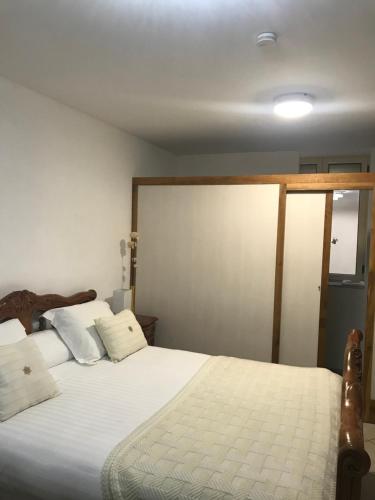 Ένα ή περισσότερα κρεβάτια σε δωμάτιο στο Chambre du couvent