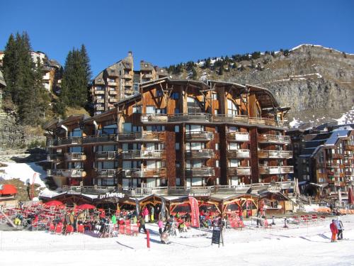 a large building on top of a ski resort at Le Mazot - Avoriaz- séjours du dimanche au dimanche in Avoriaz