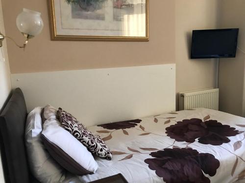 Ένα ή περισσότερα κρεβάτια σε δωμάτιο στο Bowman Lodge