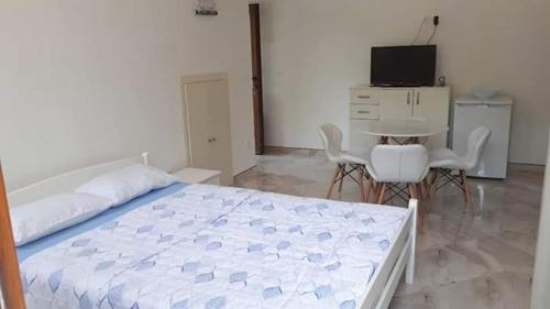 Ένα ή περισσότερα κρεβάτια σε δωμάτιο στο Nautical style studio