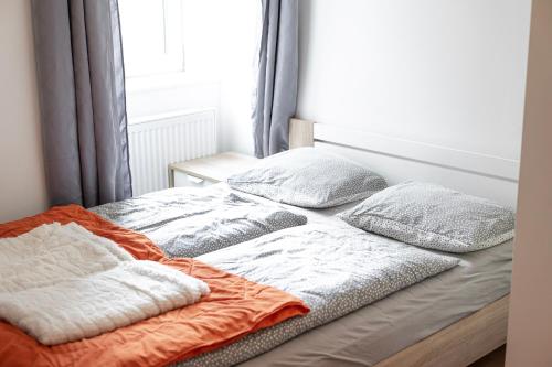 Ein Bett oder Betten in einem Zimmer der Unterkunft Vienna Lights Apartments - Meidling