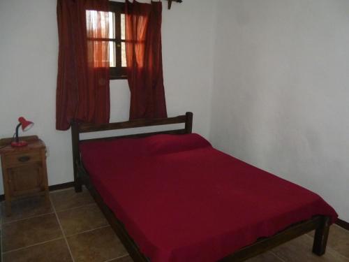 Cama o camas de una habitación en PORTOFINO BARRIO COUNTRY