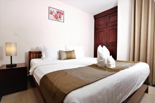Cama o camas de una habitación en MekongView 2 CondoTel