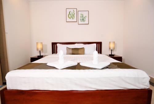 Cama o camas de una habitación en MekongView 2 CondoTel