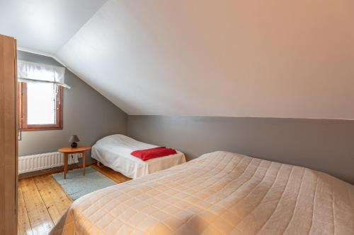 Voodi või voodid majutusasutuse Miekojärvi Resort toas