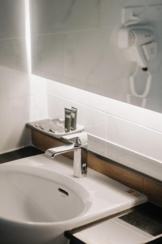 Salle de bains dans l'établissement Arista Hotel Ubon