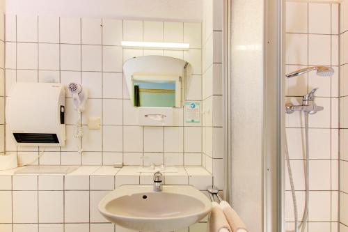 Koupelna v ubytování Hotel Fidelitas