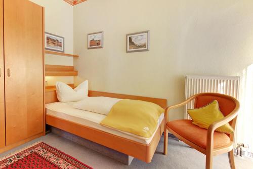 Postel nebo postele na pokoji v ubytování Hotel Fidelitas
