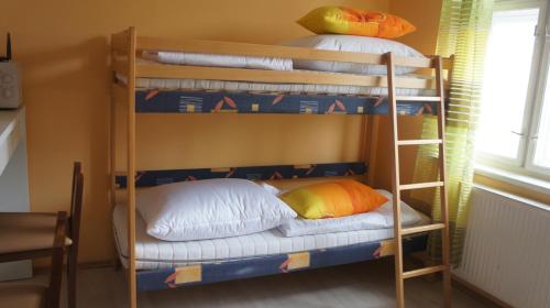 Cama o camas de una habitación en KK Apartments