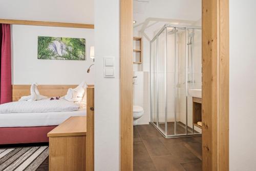En eller flere senger på et rom på Hotel Kirchlerhof